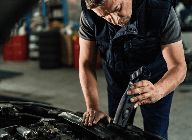 Mechanic working on a car